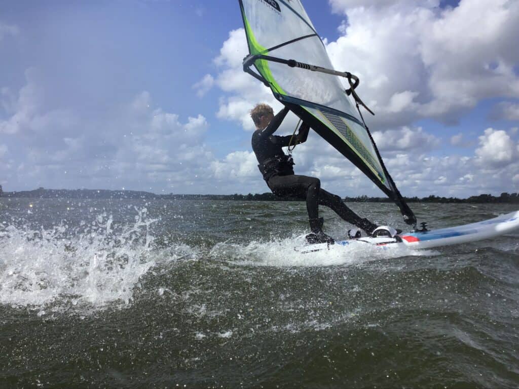 IMG_0900 A person windsurfing on the water.